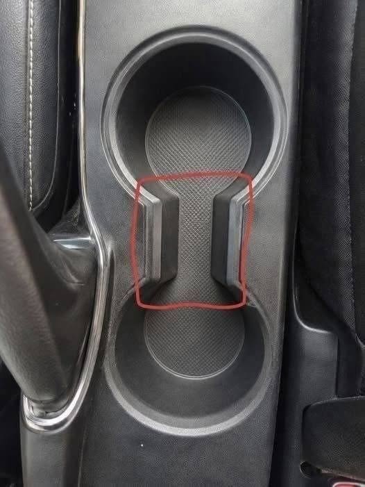 What the Gap Between Your Car Cup Holders Is Really For